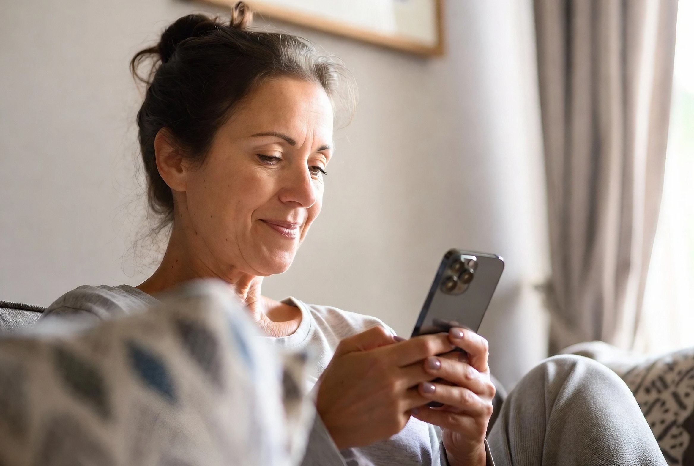 Family staying connected with loved ones through LifeAIs